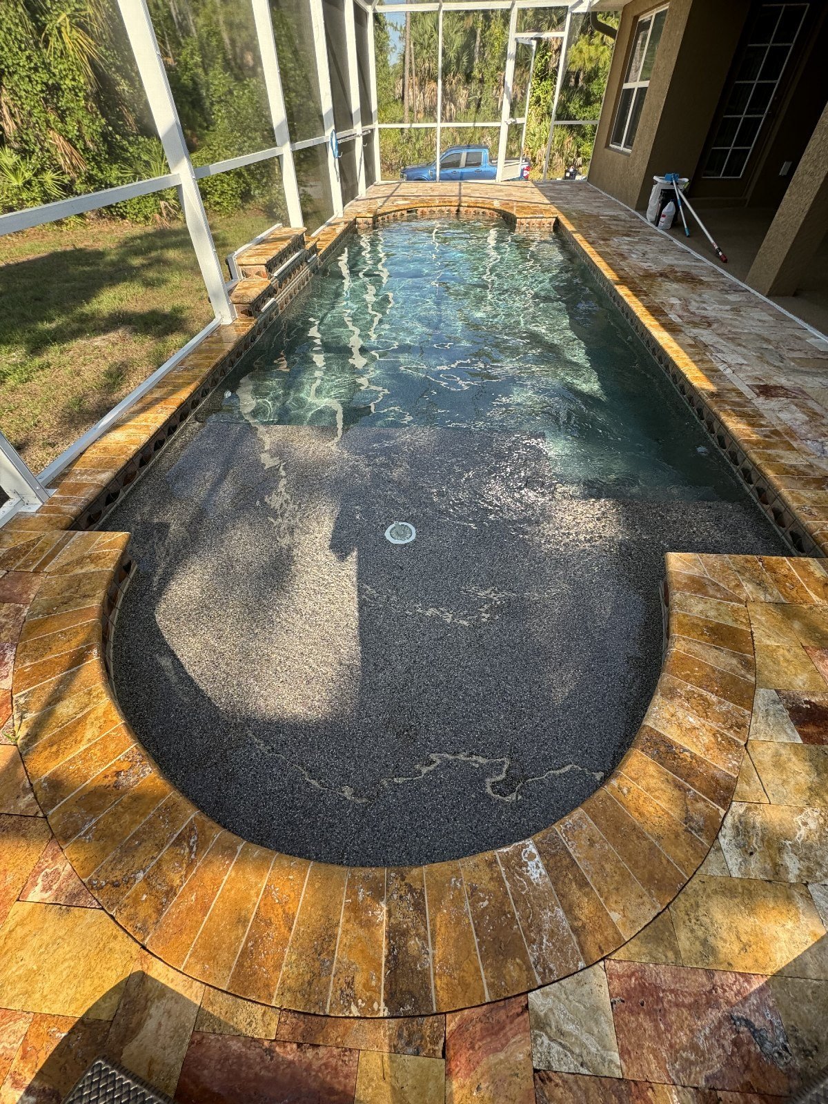 Pebble finish with a stone deck in Venice